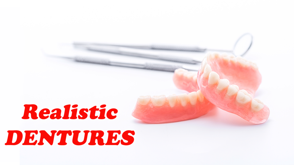 A set of realistic full dentures is displayed with dental tools in the background. The text "Realistic DENTURES" is prominently featured in red lettering on the left side of the image. The dentures have a pink gum base with white teeth.